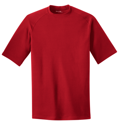 Sport-Tek Ultimate Performance T-shirt in true red, featuring a flat front design and athletic fit for active wear.