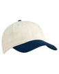 Tan and navy Print View unstructured baseball cap with printed logo, shown from side angle.