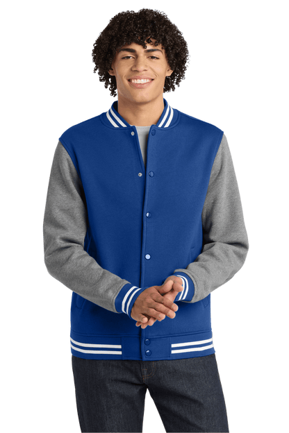 True Royal varsity jacket by Sport-Tek featuring vintage heather fabric and customizable or plain design, shown in print view.