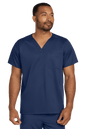 Navy unisex medical scrubs top by Wink with a V-neck and flexible chest pocket, designed for comfort and professional healthcare wear.