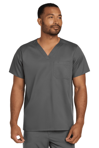 Unisex Wink medical scrubs top in pewter grey with a V-neck and front flex chest pocket, designed for healthcare professionals.
