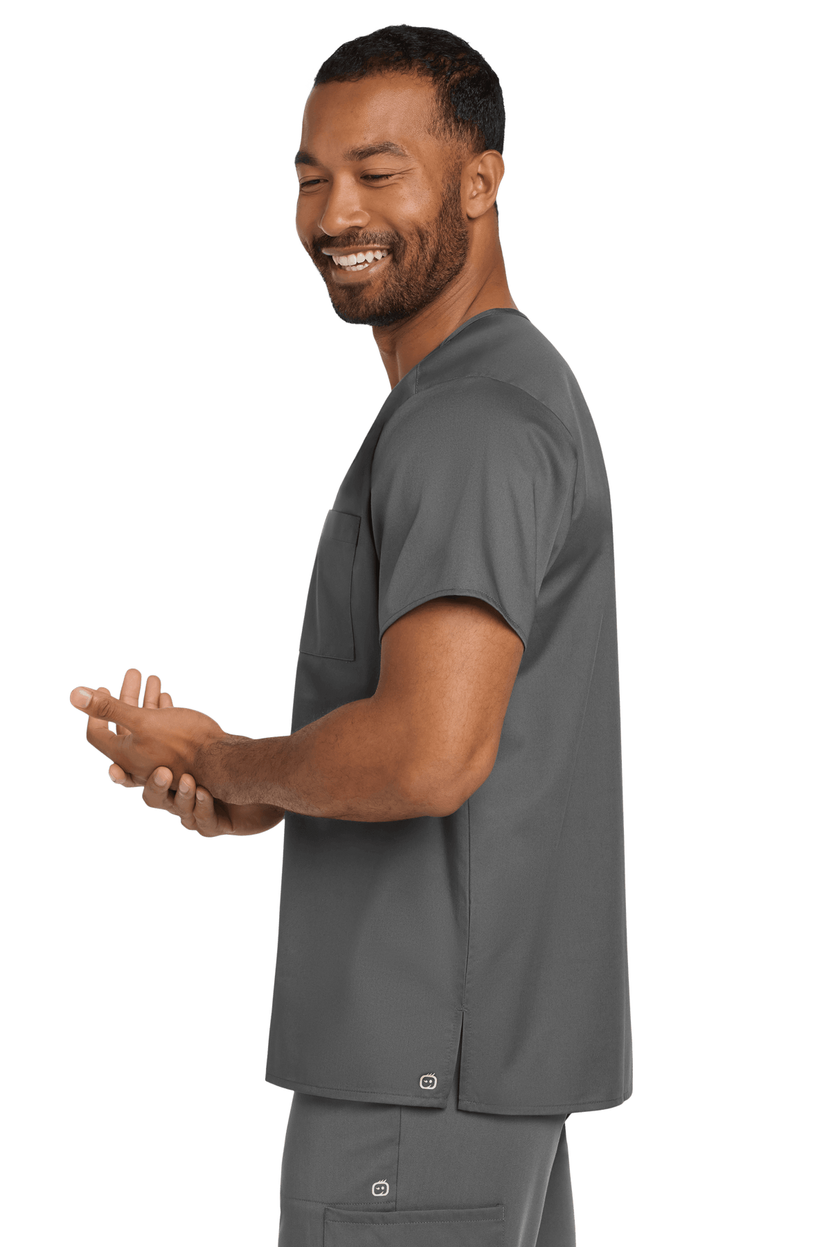 Wink unisex medical scrubs V-neck top in Pewter Grey with flexible chest pocket, shown from side view.
