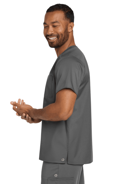 Wink unisex medical scrubs V-neck top in Pewter Grey with flexible chest pocket, shown from side view.