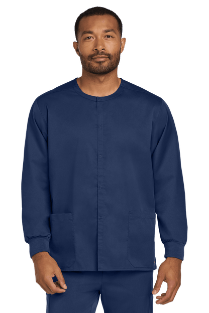 Navy unisex workwear Flex snap-front scrub jacket by Wink, shown from the front with a relaxed fit and functional design.