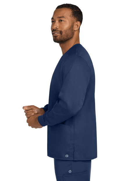 Navy unisex workwear scrub jacket with snap-front closure, shown from side view, by Wink, designed for healthcare professionals.
