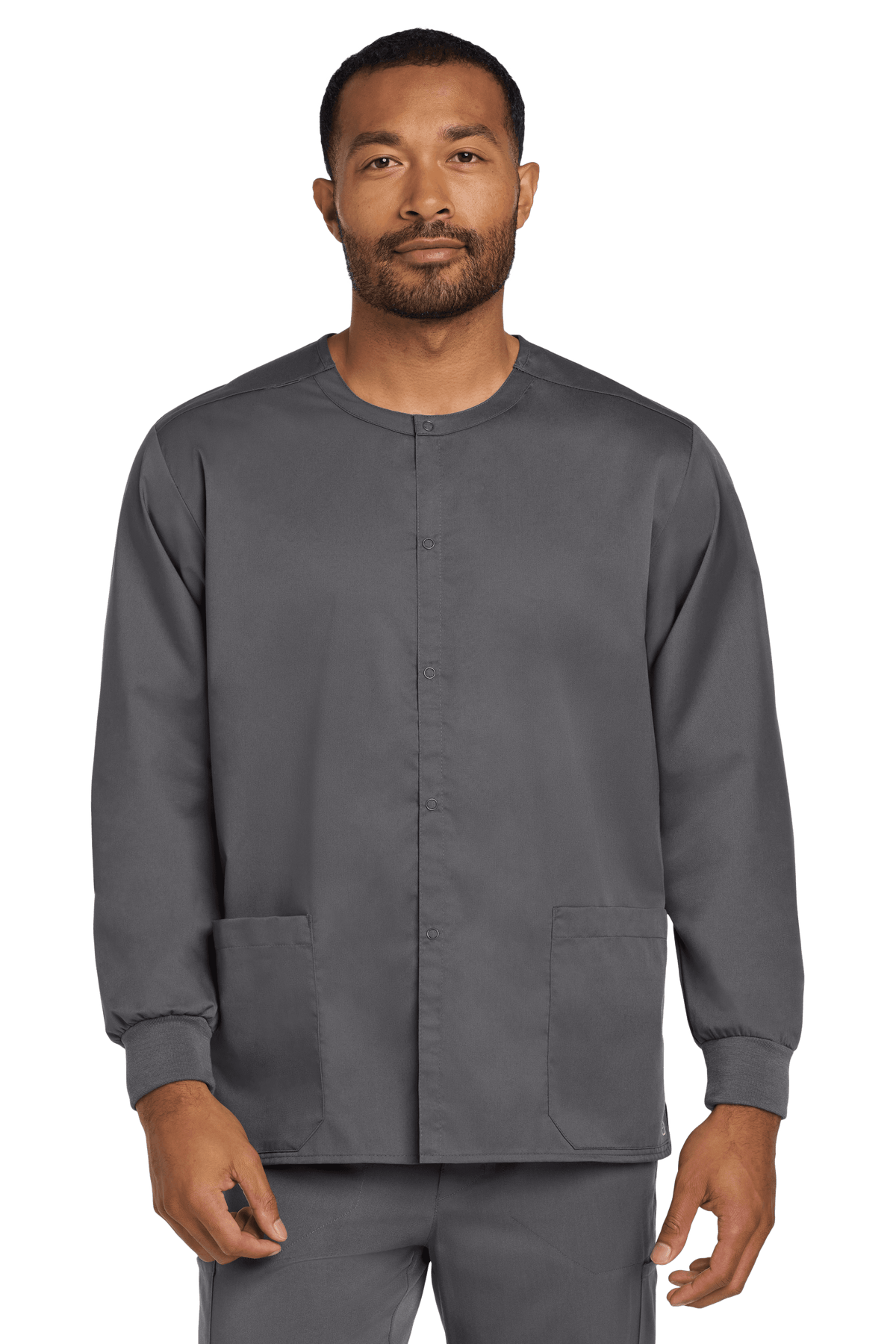 Unisex Wink workwear scrub jacket in pewter grey with snap front, flexible fabric, worn by a model showing front view.