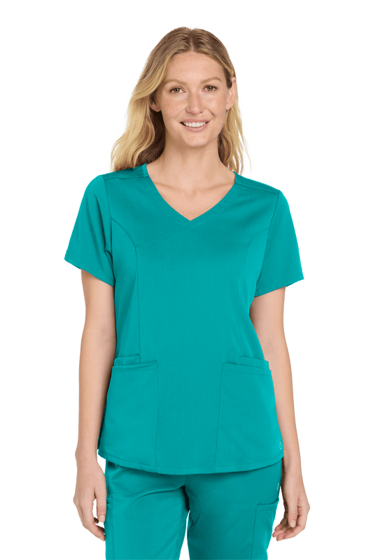 Wink women's Premiere Flex mock wrap scrub top in teal, showing front view with printed design and fitted style.