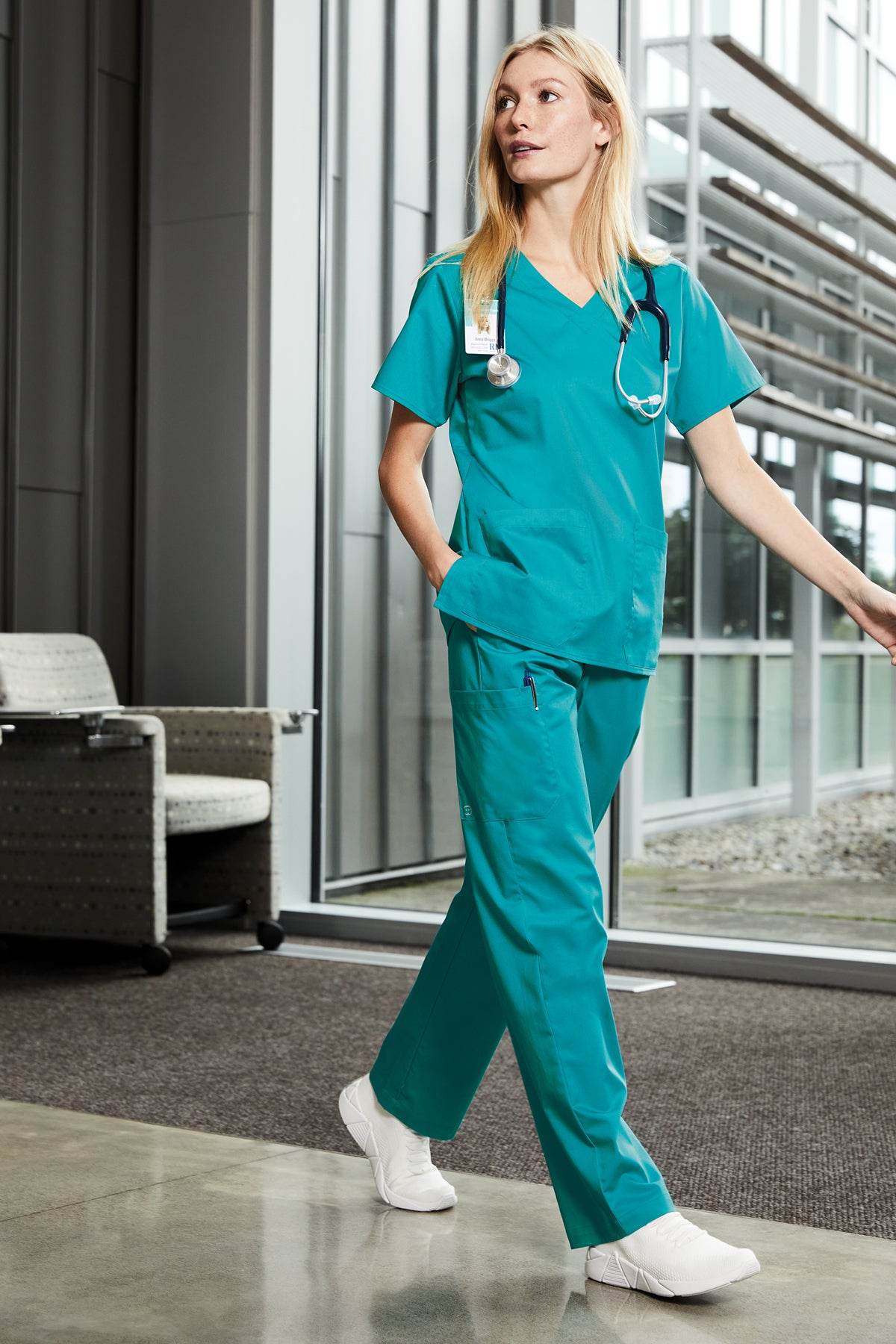Women's Wink Medical Workwear Flex Cargo Scrubs pants with printed design, featuring comfortable fit and functional pockets.