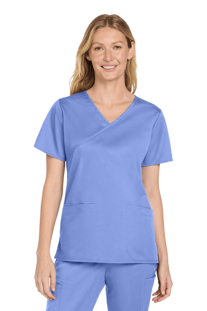 Light blue Women's Medical WorkFlex™ mock wrap scrub top by Wink with a stylish print, designed for comfortable healthcare workwear.