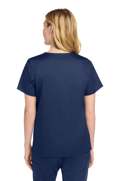 Navy women's Medical WorkFlex™ mock wrap scrub top by Wink, featuring a printed design, shown from the back view.