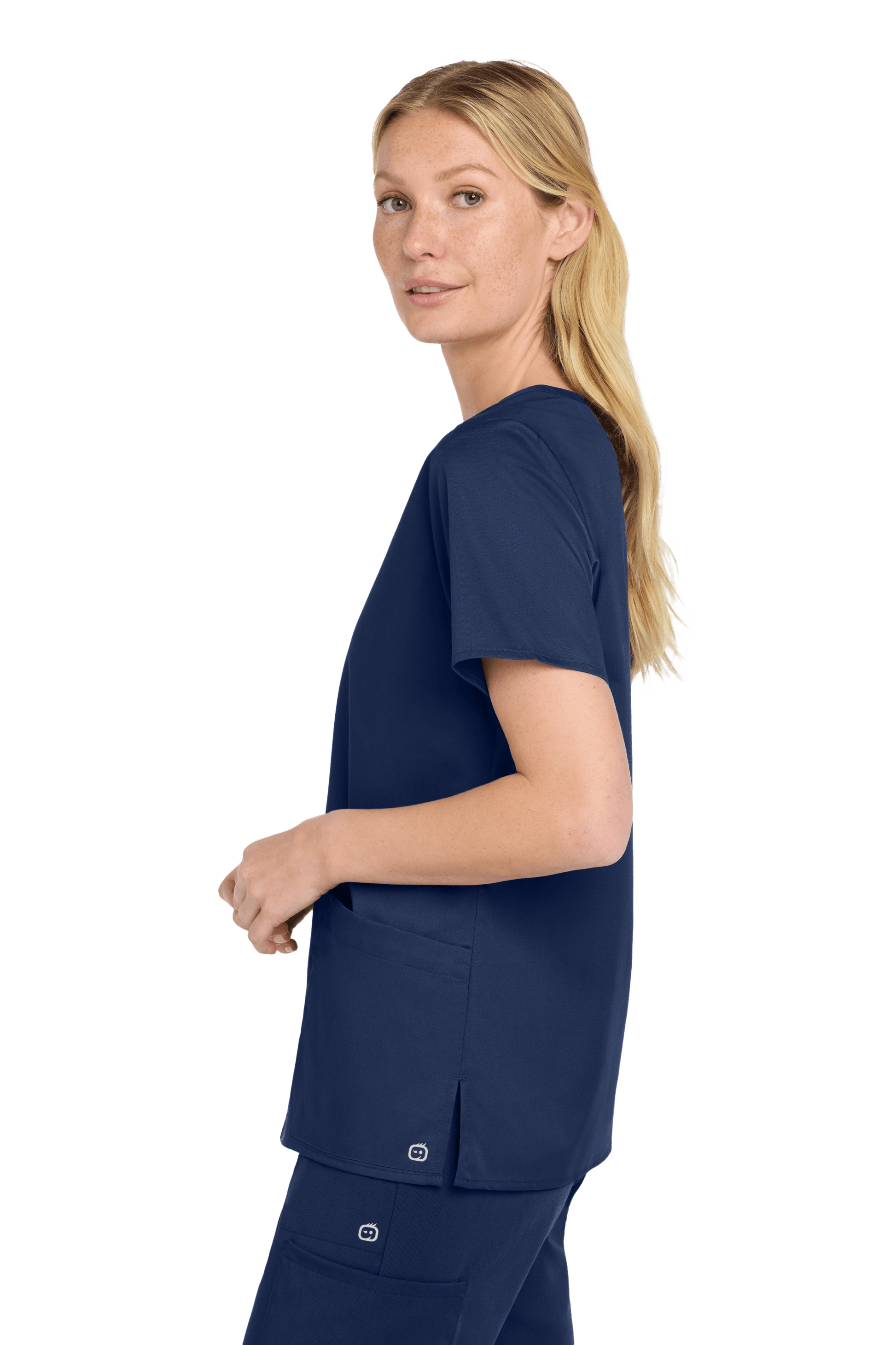 Women’s Wink Medical WorkFlex™ mock wrap scrub top with navy print, shown from side view, designed for comfortable medical workwear.