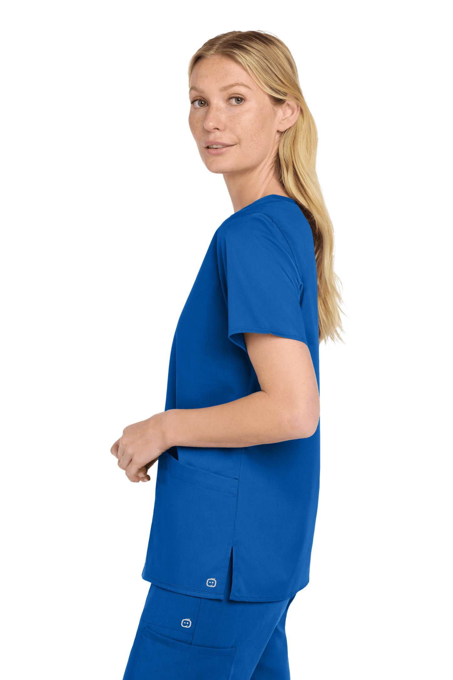 Women's Royal Blue Medical WorkFlex™ mock wrap scrub top by Wink, featuring a stylish print design, shown from a side view.