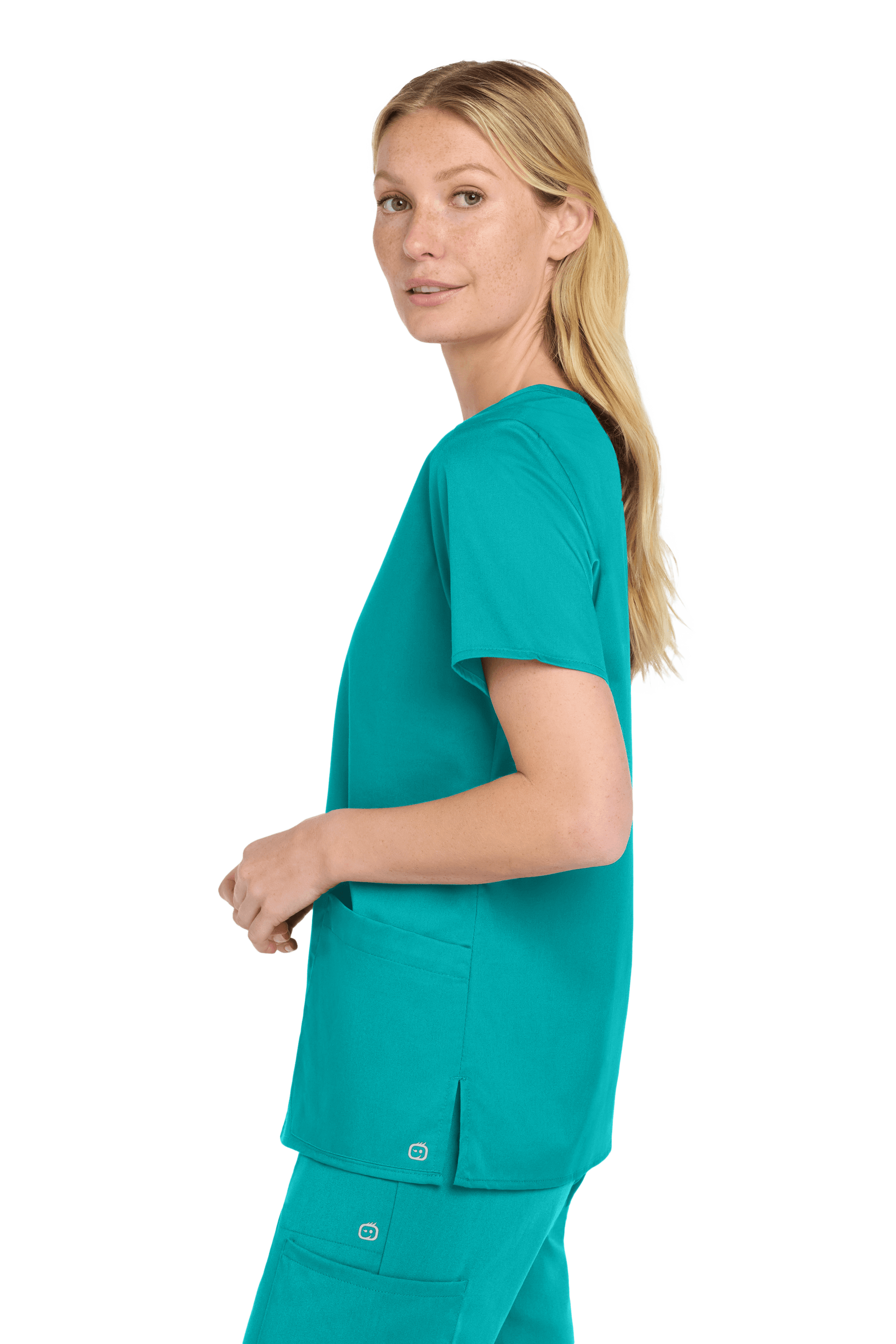 Wink Women's Medical WorkFlex™ mock wrap scrub top with teal print, shown from side view on a model.