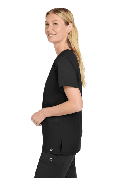 Wink women's black V-neck scrub top with print design, shown from side view, made for medical workwear with comfortable fit.