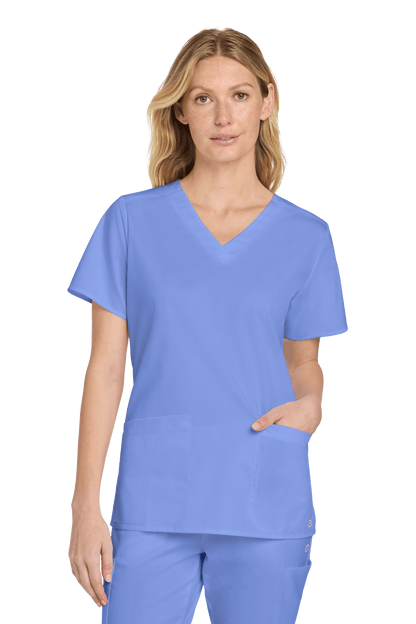 Light blue women's medical scrub top by Wink with a V-neck and print design, featuring flexible, comfortable workwear for healthcare professionals.