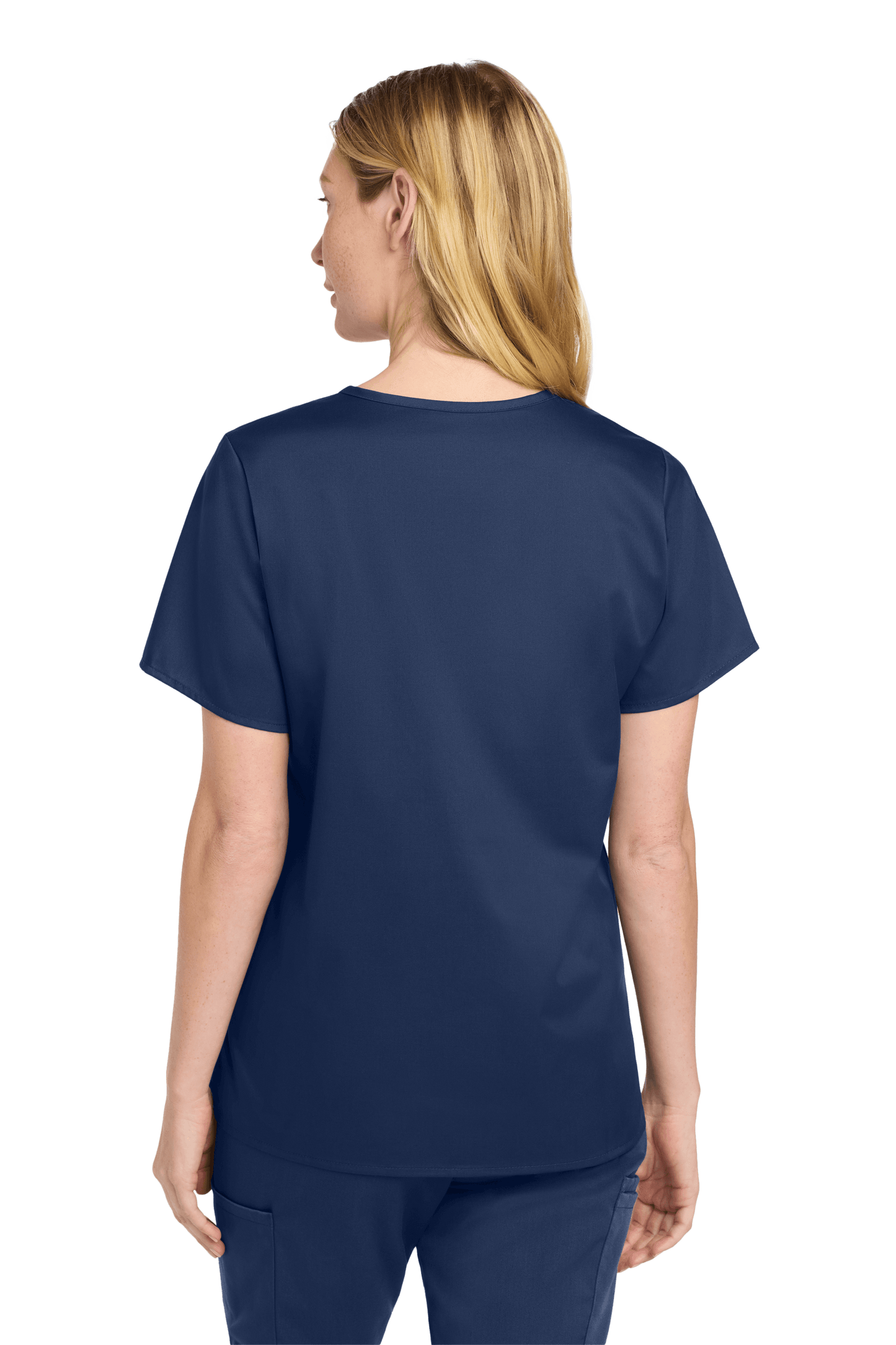 Women’s navy blue Flex V-Neck scrub top by Wink with printed design, shown from the back on a model.