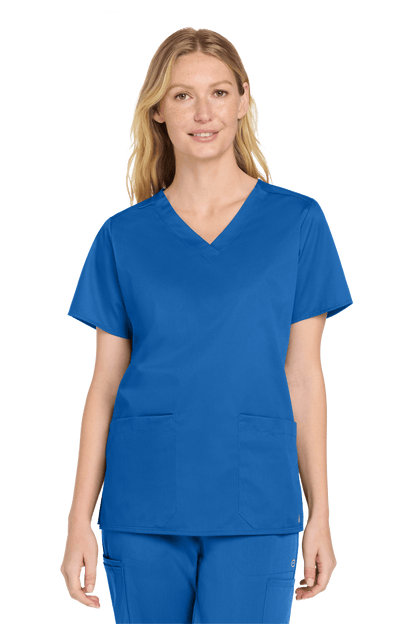 Wink women's medical workwear flex V-neck scrub top with a blue print, front view showing comfortable fit and stylish design.
