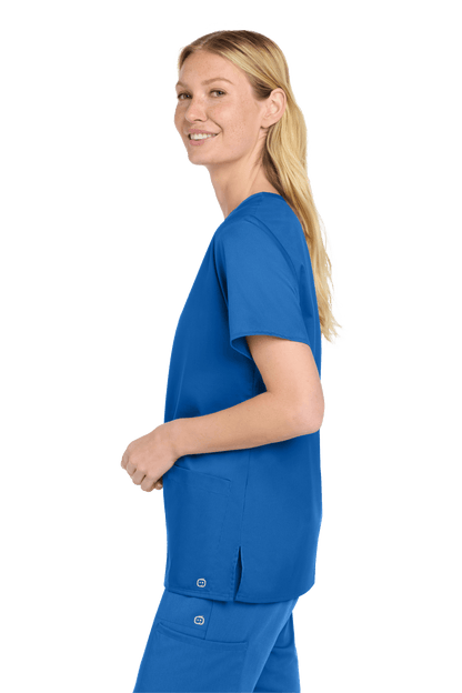 Women’s Royal Blue Flex V-Neck Scrub Top by Wink, showcasing a comfortable medical workwear style with printed design.