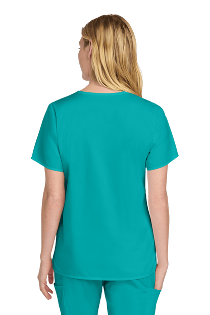 Women’s Wink medical scrub top with a teal print, V-neck design, and comfortable fit, shown from the back view.