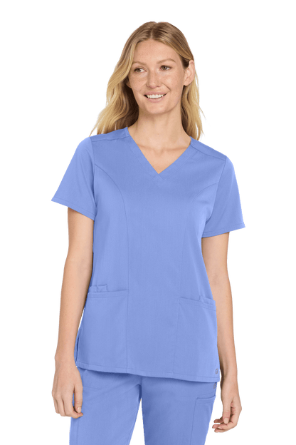 Light blue women's Premiere Flex V-neck scrub top by Wink, front view showing comfortable fit and V-neck design.