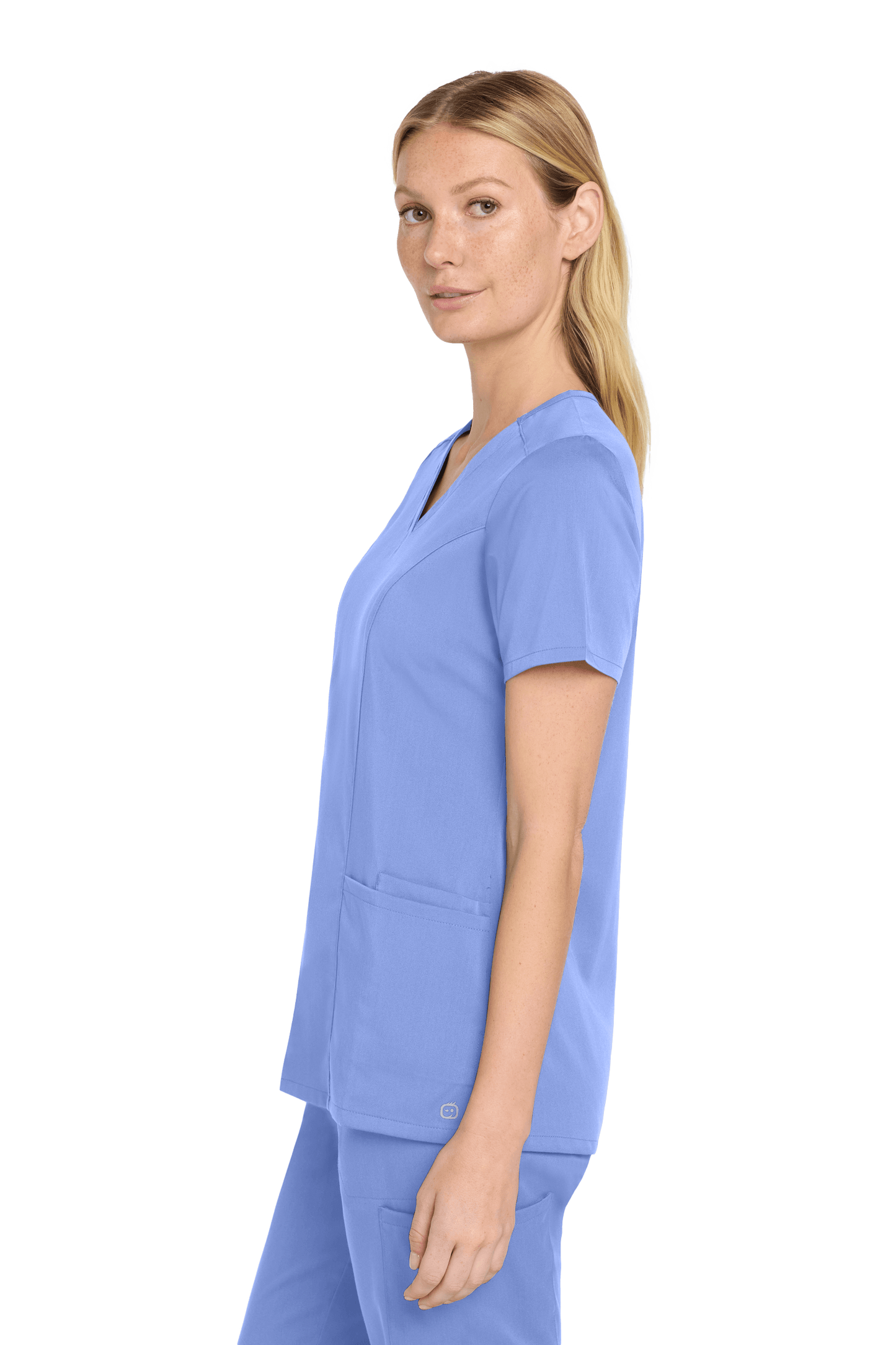 Light blue women's Premiere Flex V-neck scrub top by Wink, shown from the side view with a fitted, comfortable fit.