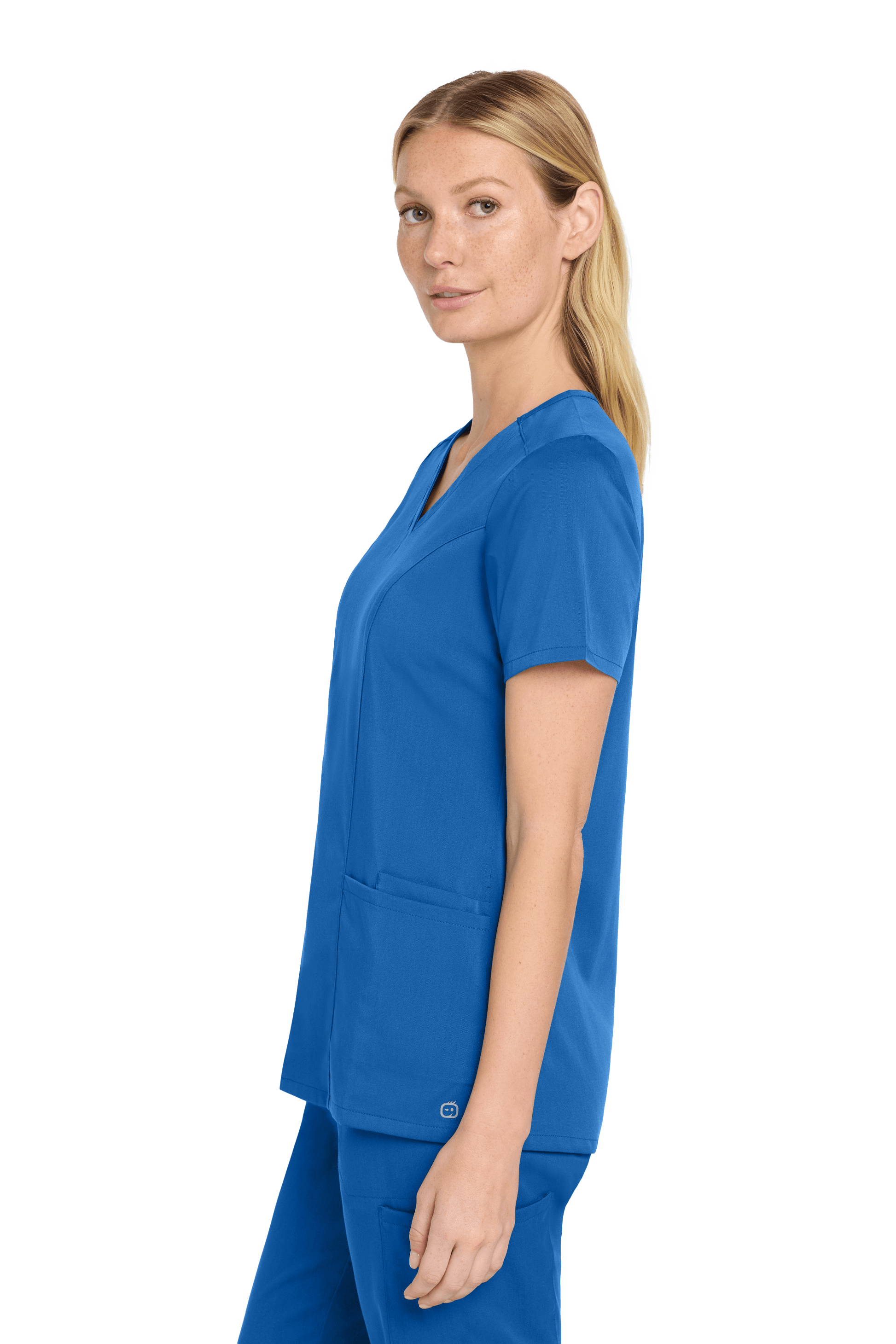 Women’s Wink Premiere Flex V-Neck Scrubs in royal blue, shown from the side with a printed design and flexible fabric.