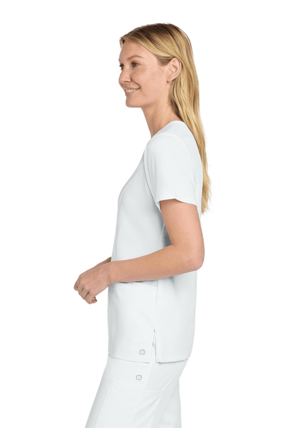 Women’s Wink Premiere Flex V-Neck Scrubs in white, side view showing soft fabric and comfortable fit.