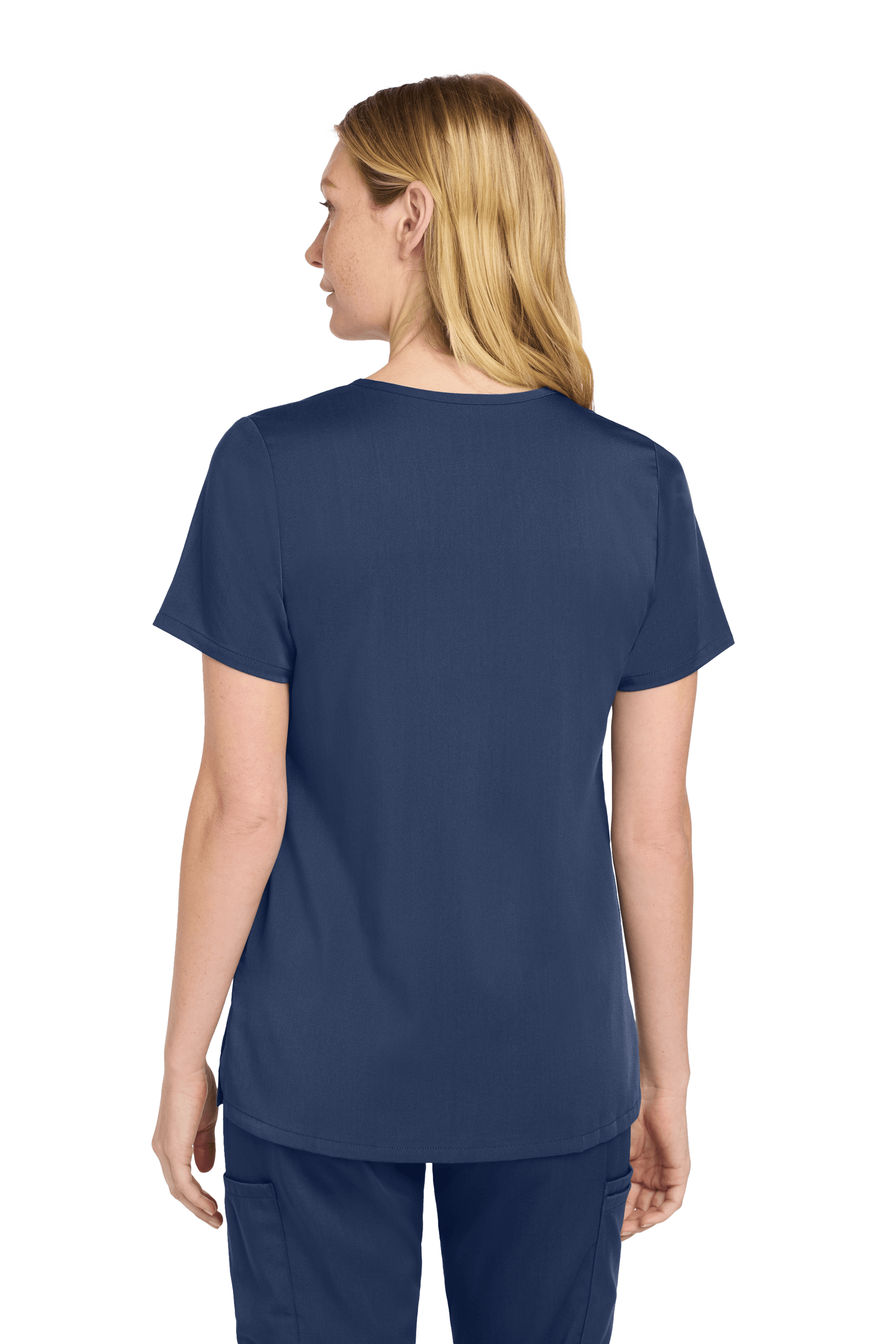 Women’s navy blue Premiere Flex V-neck scrub top by Wink, shown from the back with a fitted design and subtle print details.