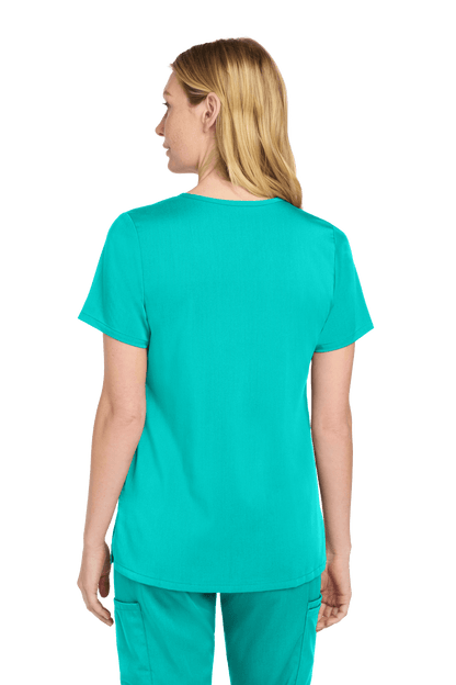 Wink Women’s Premiere Flex V-Neck Scrubs in teal with print, shown from back, featuring comfortable scrub top for medical professionals.