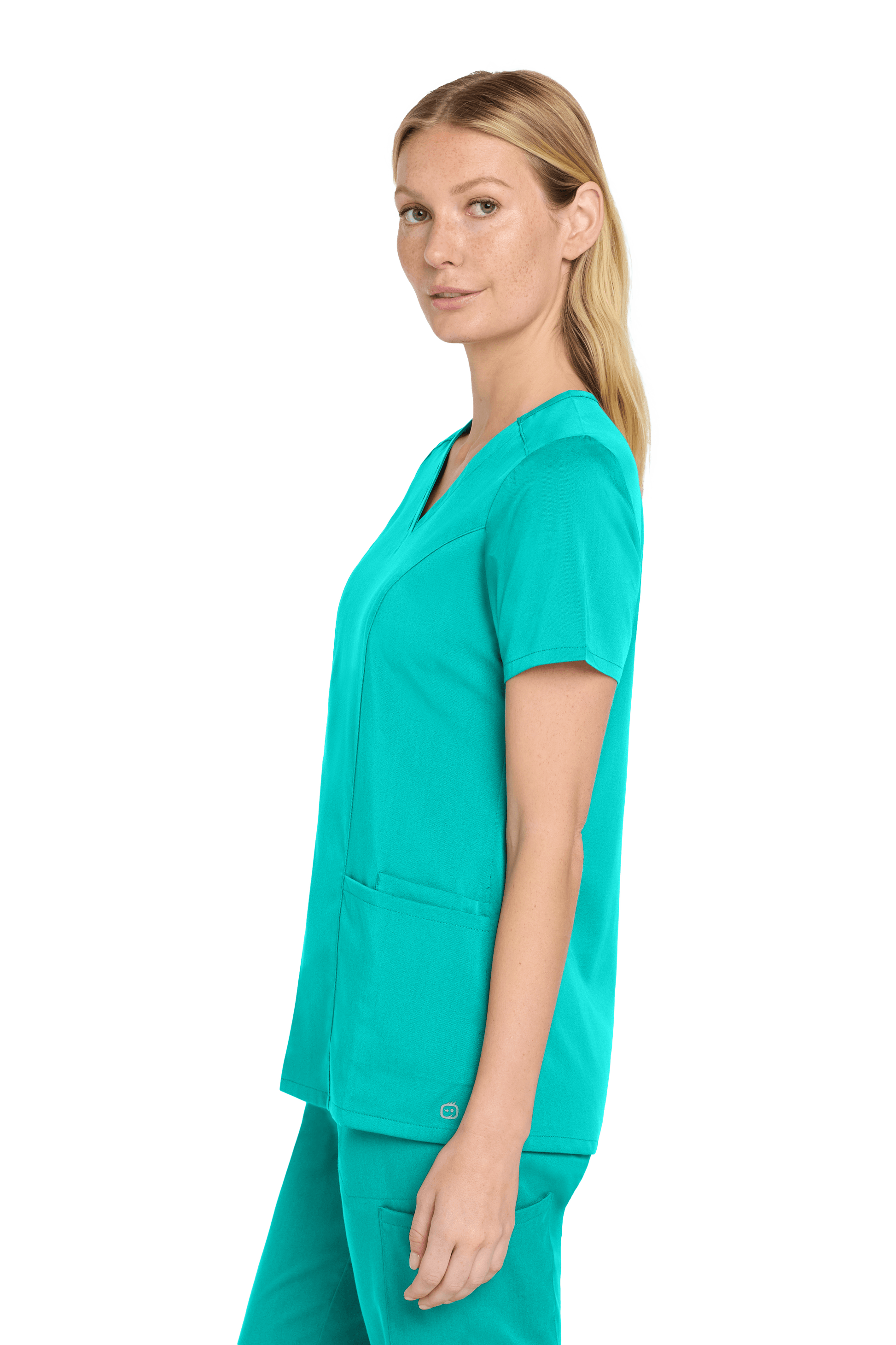 Women’s Wink Premiere Flex V-Neck Scrubs in teal, shown from side view, featuring a comfortable fit and stylish print design.